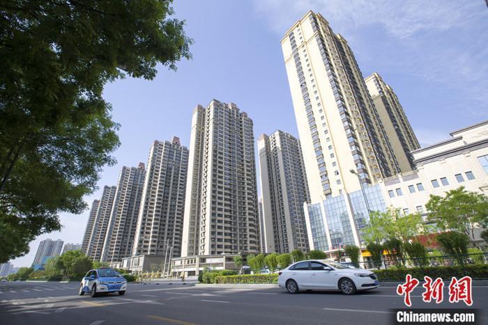 資料圖：車輛從一樓盤前經(jīng)過。 <a target='_blank' href='/'><p  align=